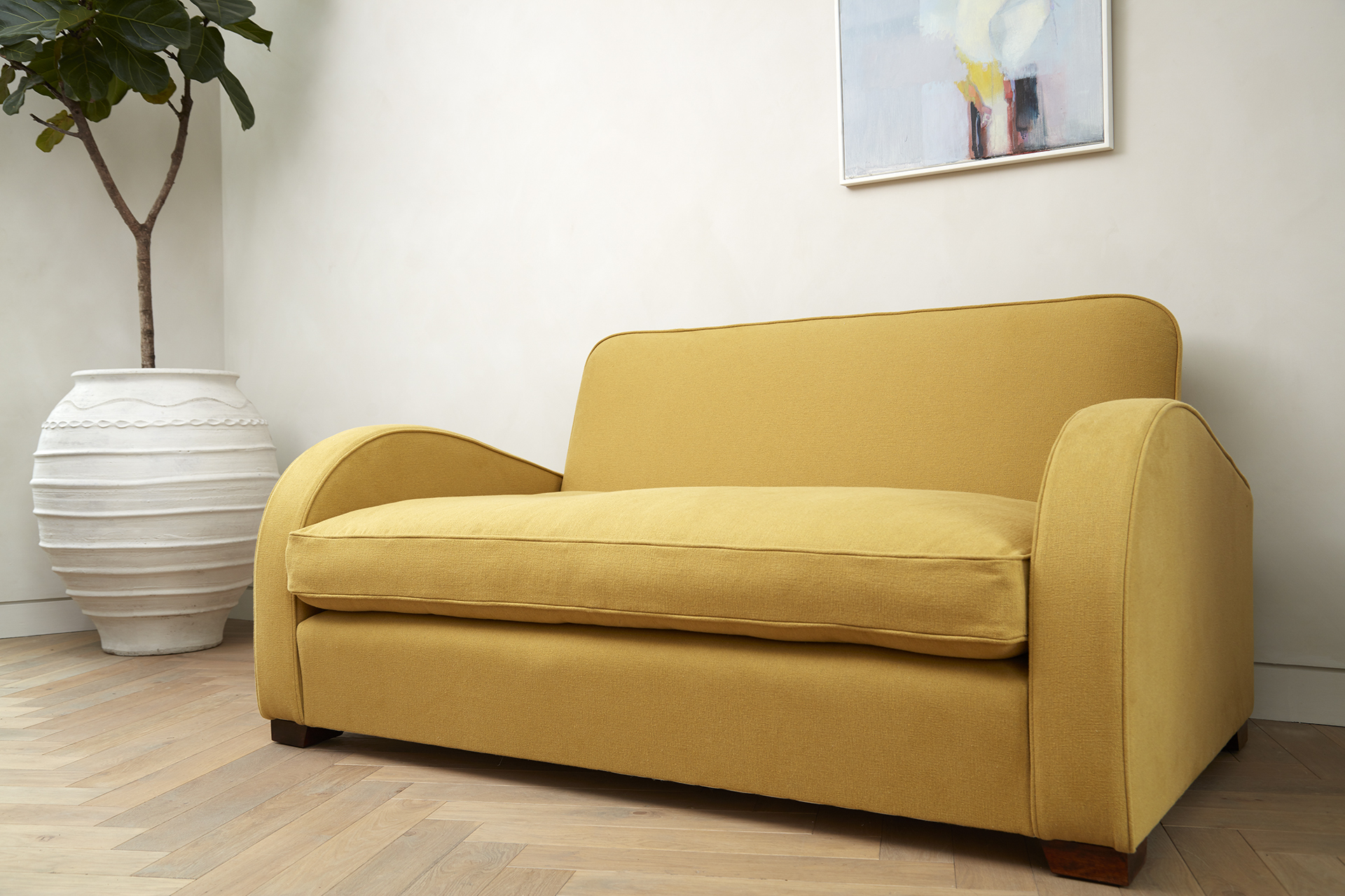 Yellow 2 seater Daisy sofa in 100% cotton, also offering bespoke furniture.